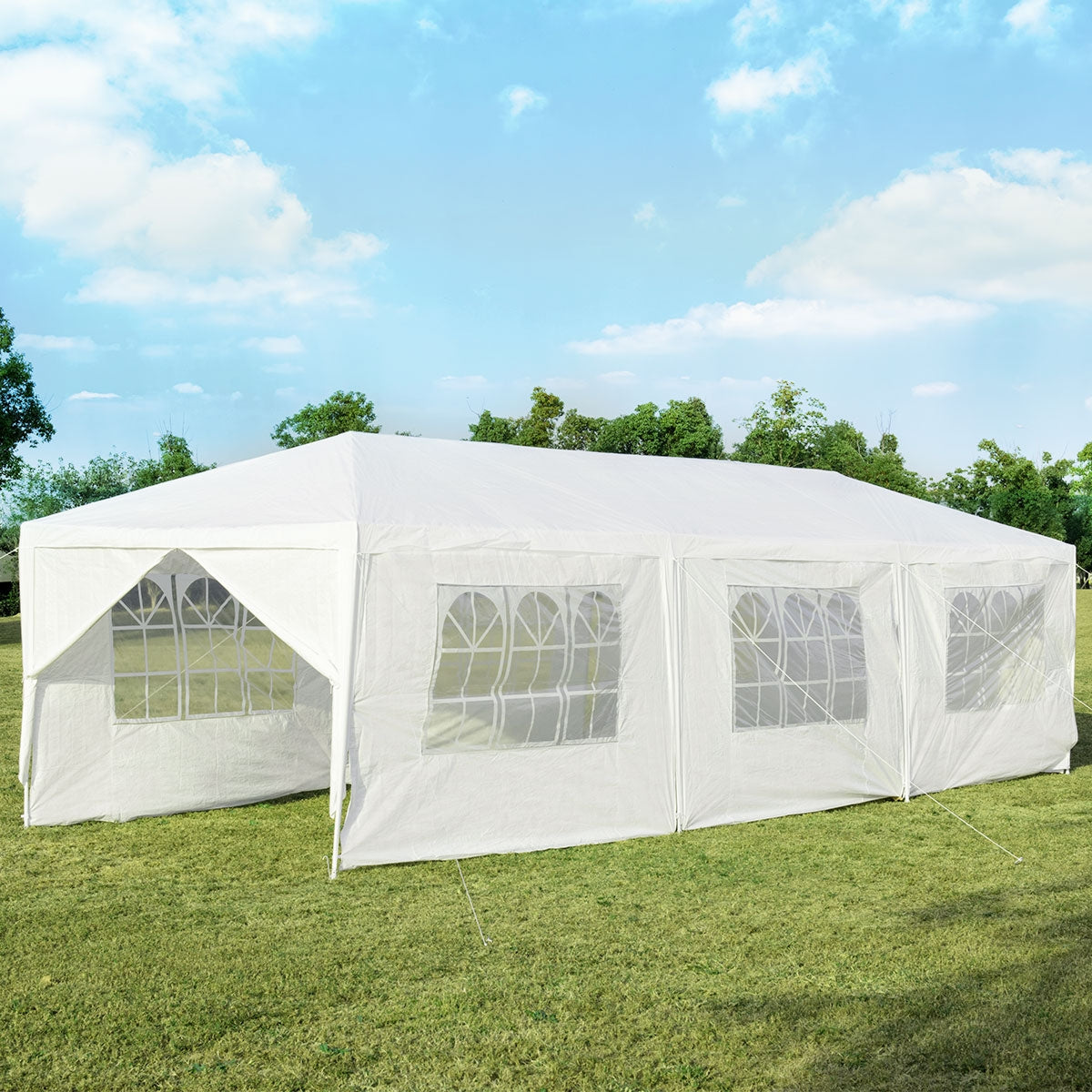 White canopy tent on a lawn, showing clear window panels along the side and an open end.