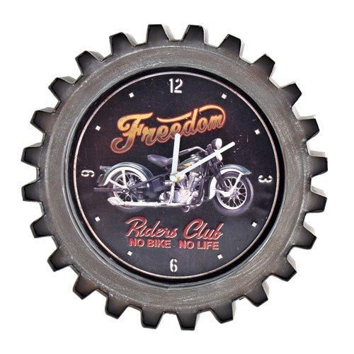 A gear-edged clock with a motorcycle illustration on a dark face and a distressed gray frame.