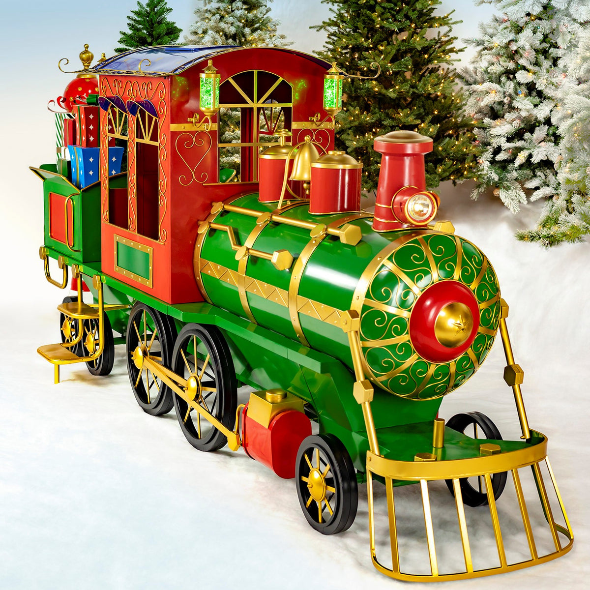 Angled front view of a green and red iron Christmas train with gold details