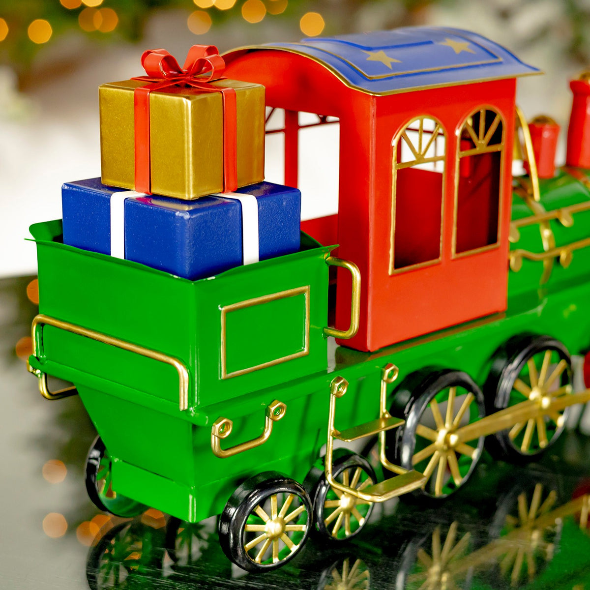 Close-up of the green rear cart stacked with colorful gift boxes