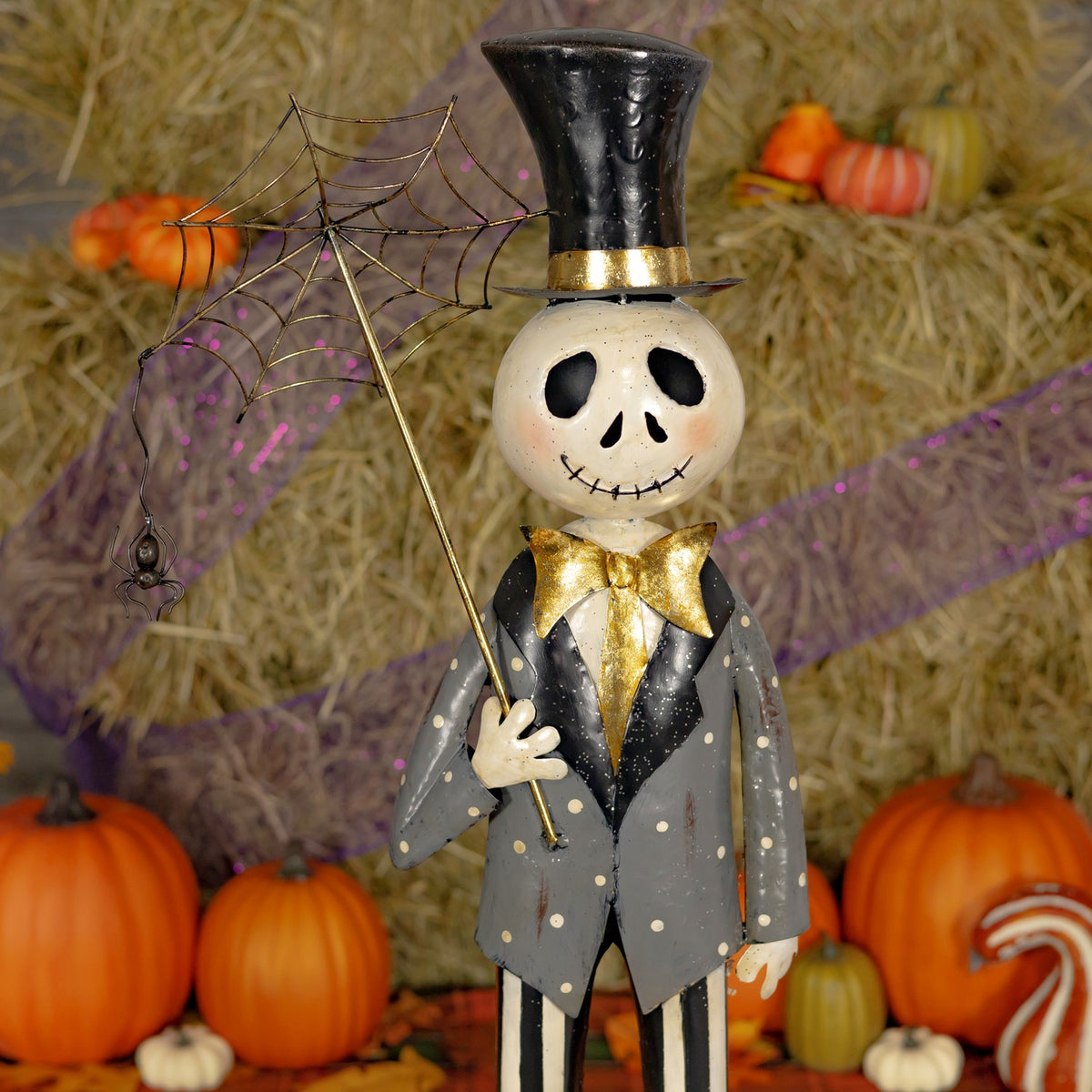 Front view of the skeleton boy's upper body and spiderweb umbrella