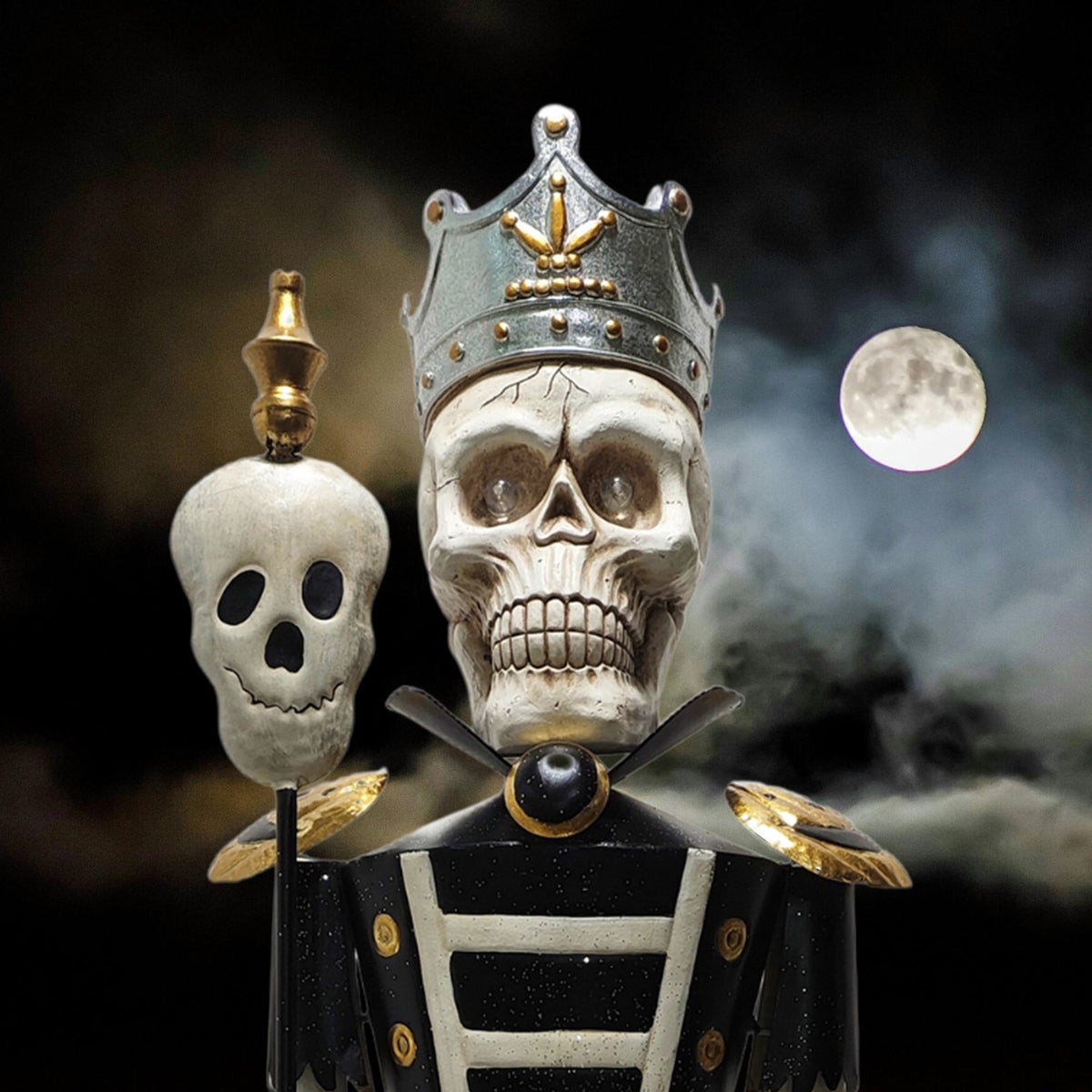 Close-up of a crowned skeleton sentry with a skull staff against a moonlit backdrop