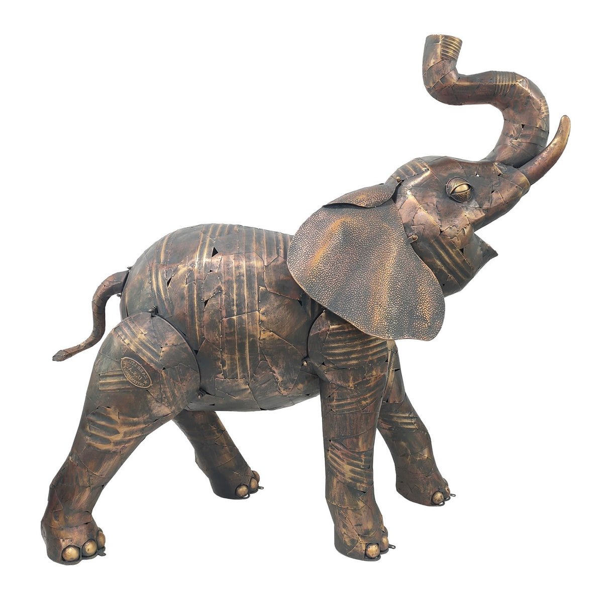 Distressed brown metal elephant statue in a front-side view on white