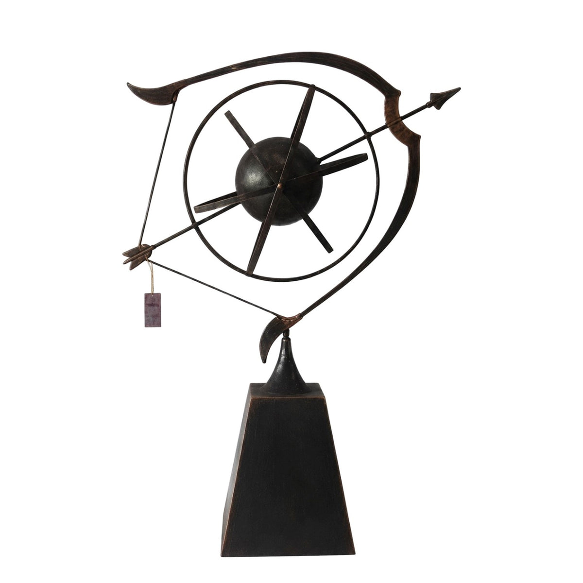 Dark metal bow-and-arrow sculpture with a circular center and tapered pedestal, shown against a white background.