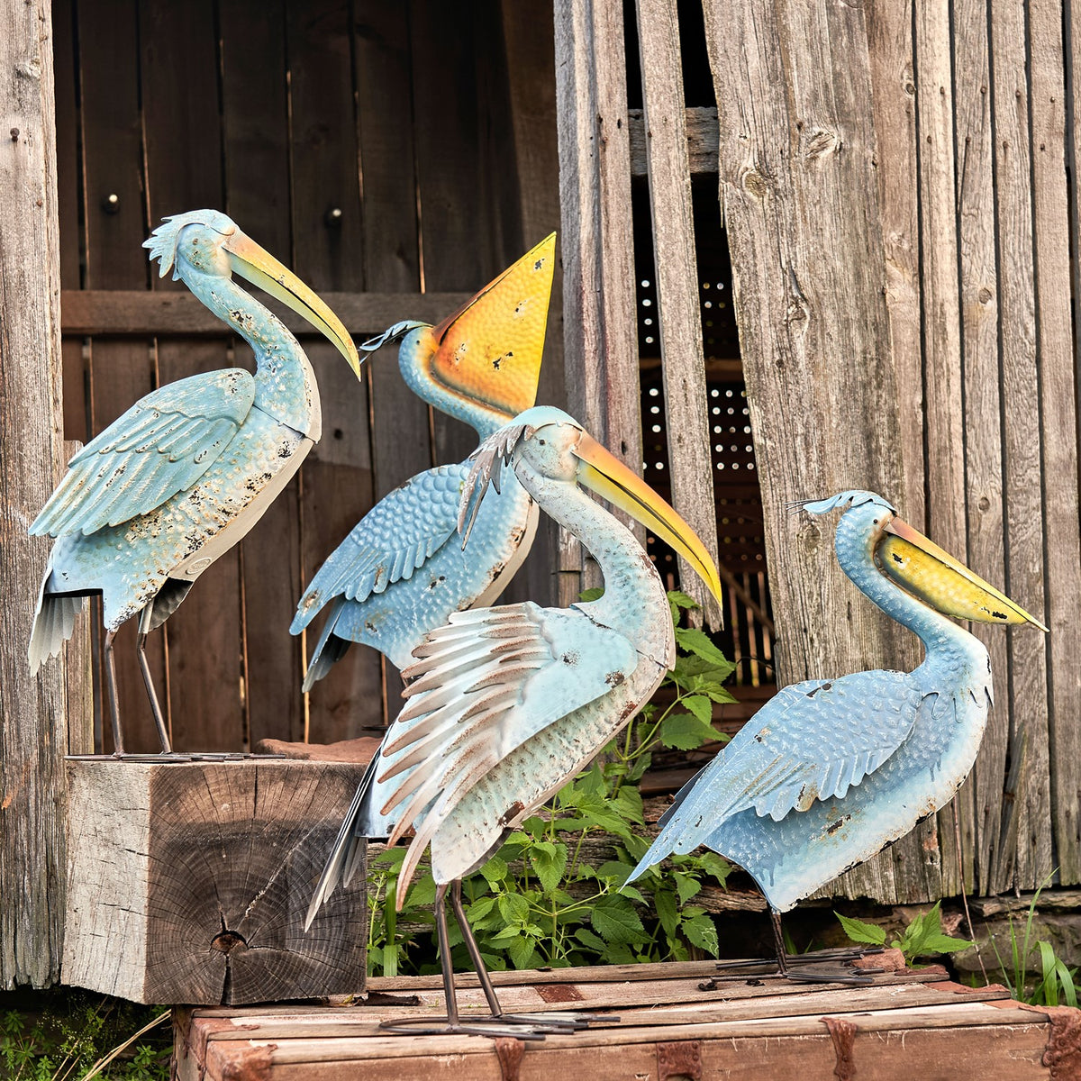 Set of 4 Assorted Style Coastal Blue Pelicans