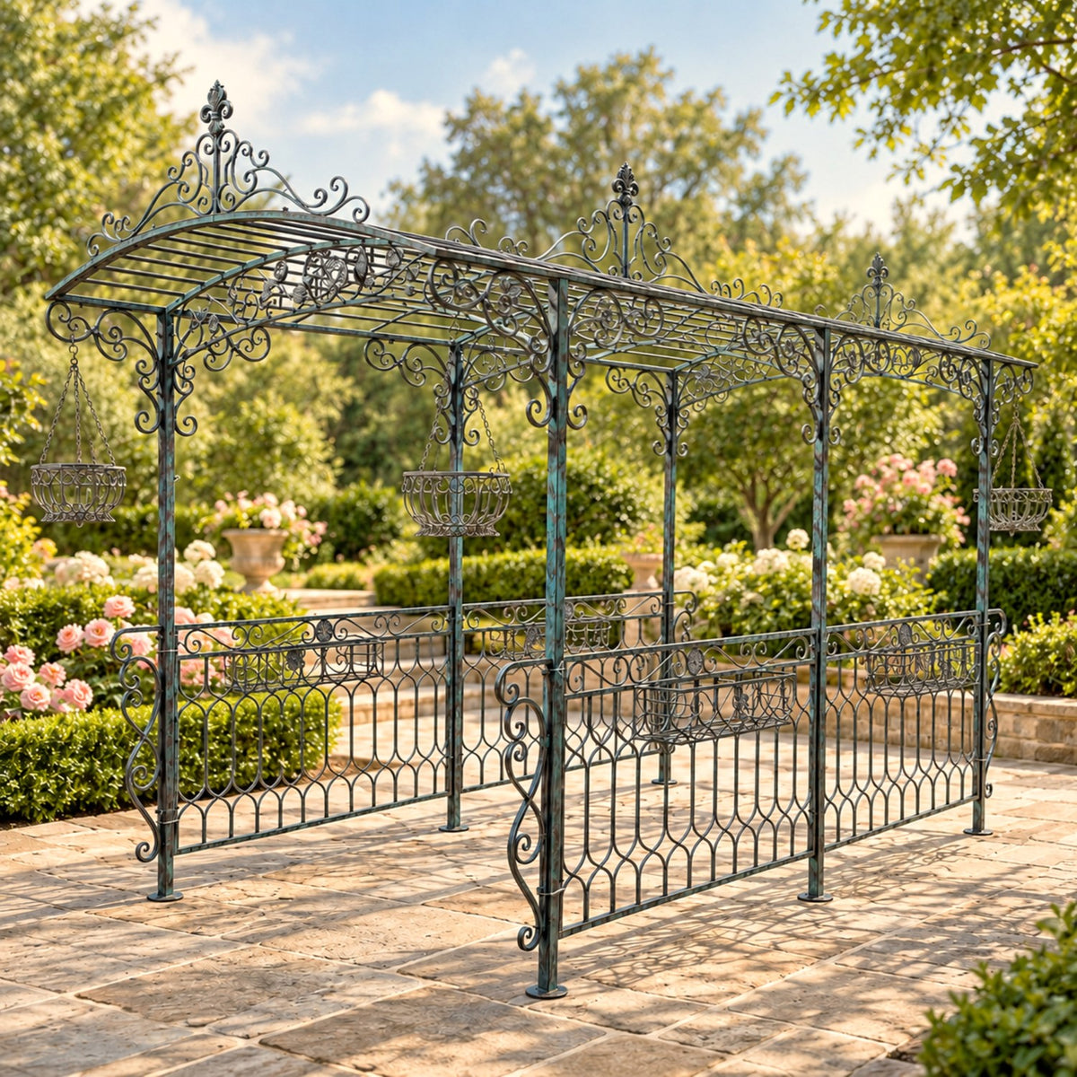 Dark blue garden gazebo with hanging baskets and side planters on a stone patio