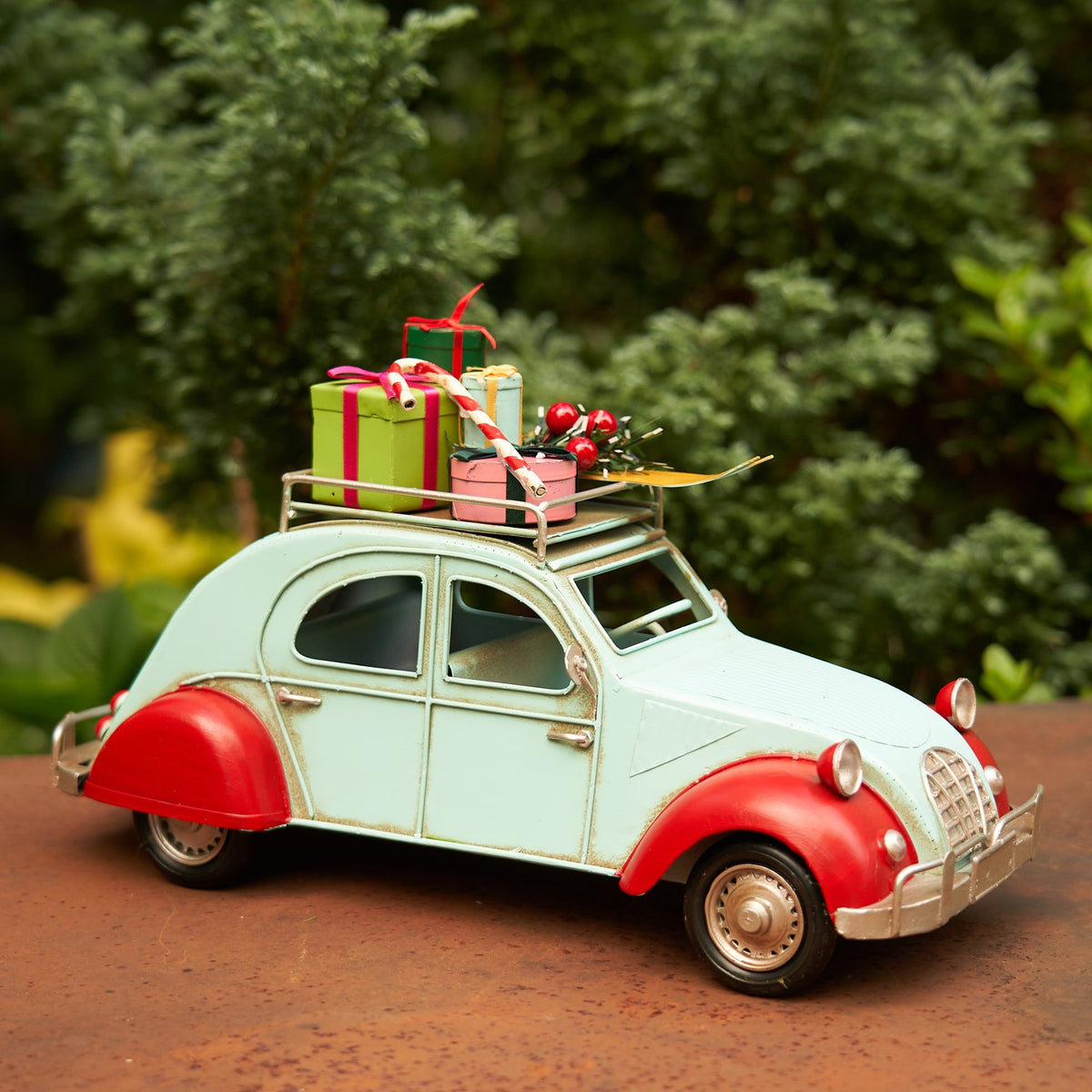 Blue and Red Buggy with Christmas Gifts