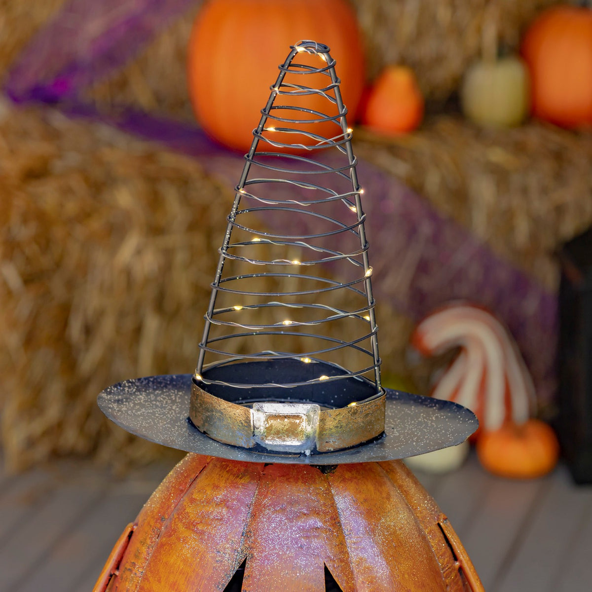Close-up of the metal spiral witch hat with small LED lights