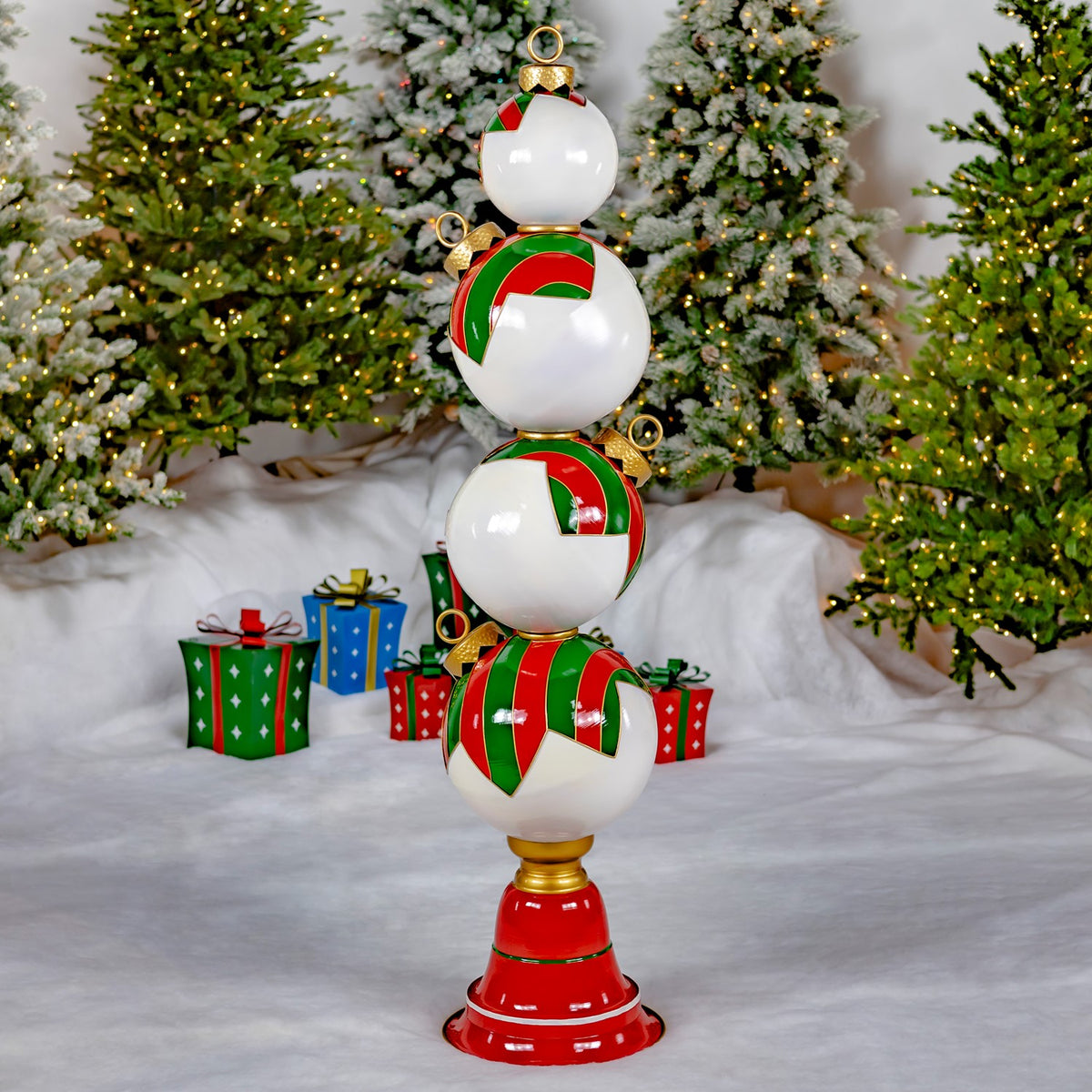 The ornament tower is shown from behind, revealing mostly plain white backs and red-and-green striped sections.