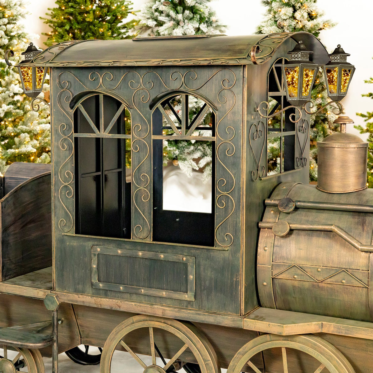 Close-up of the antique bronze train cab windows and glowing lanterns