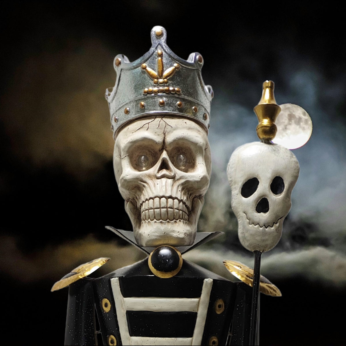 Crowned skeleton sentry and skull staff in a close-up against a smoky moonlit backdrop