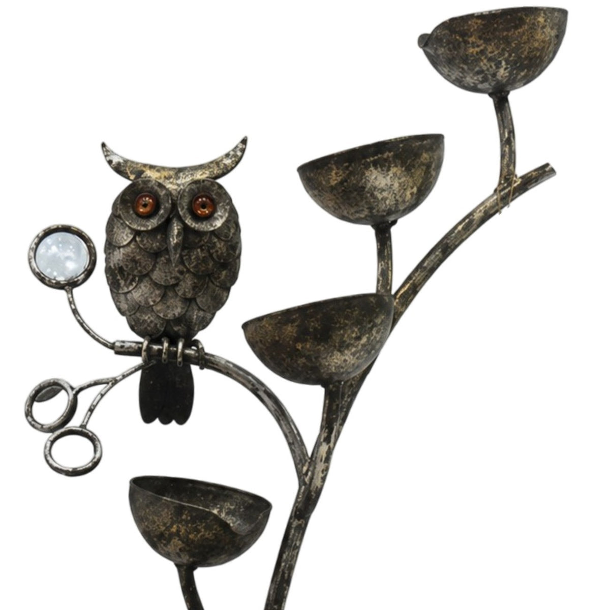Close-up of the owl ornament, round mirror, branching stem, and upper cascading bowls.