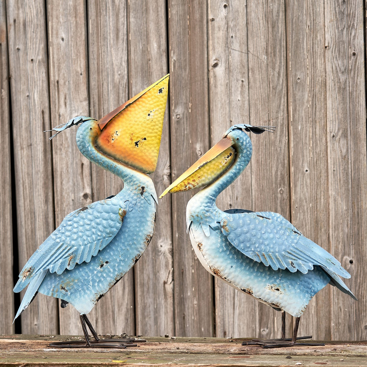Set of 4 Assorted Style Coastal Blue Pelicans