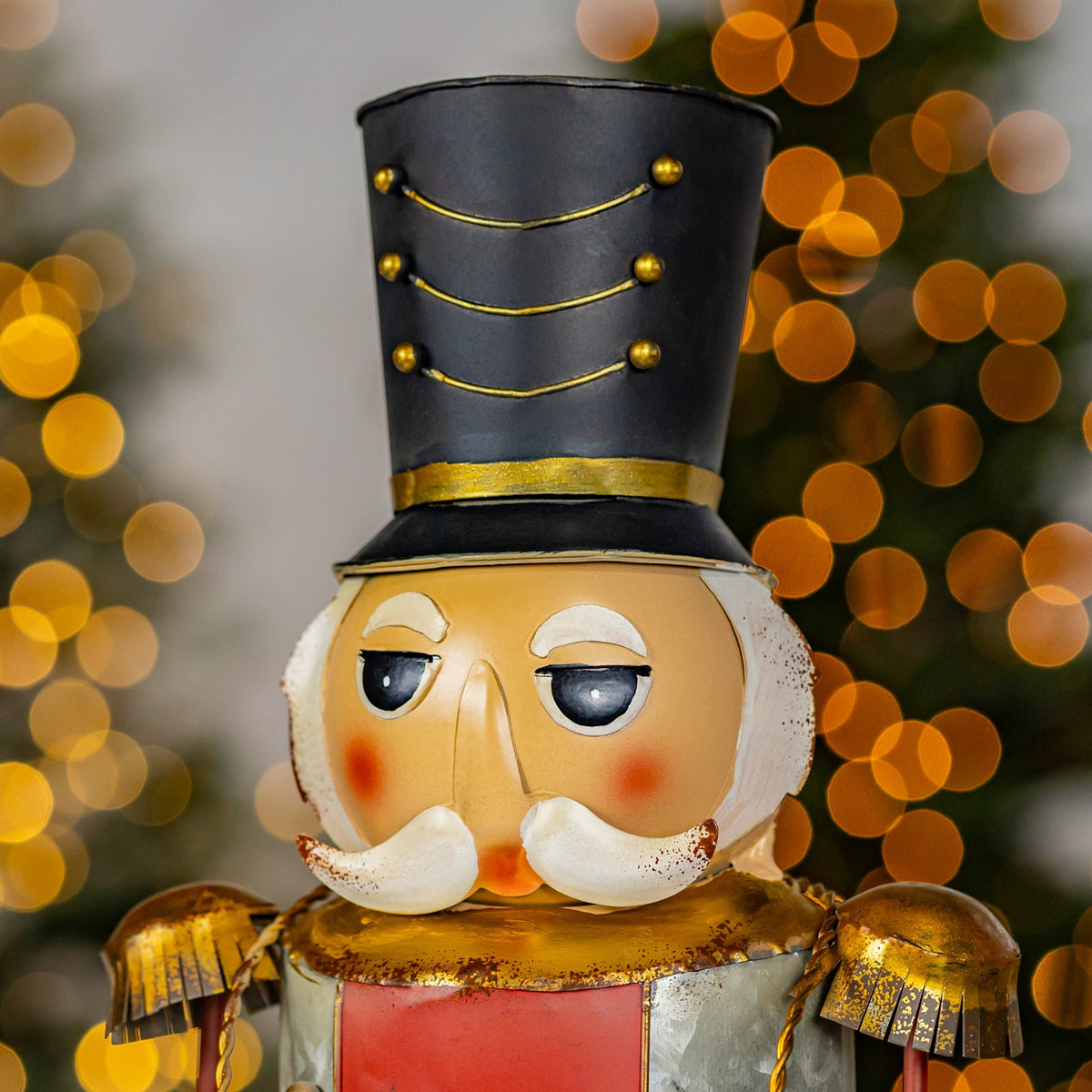 Close-up of the nutcracker's painted face and tall black hat