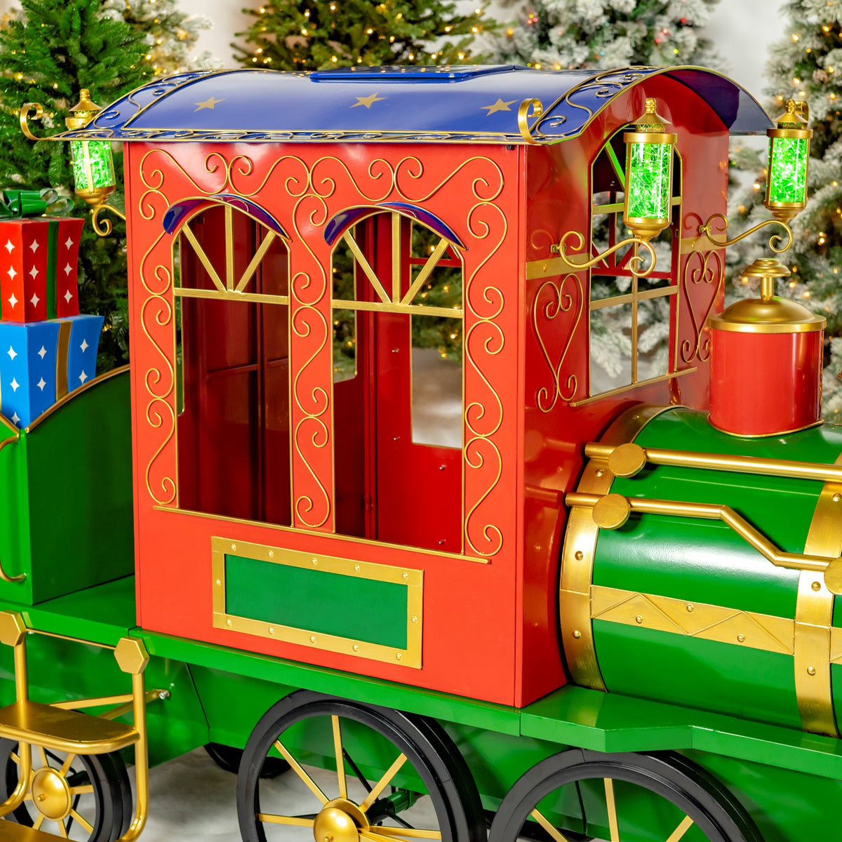 Red train car with arched windows and green and gold trim