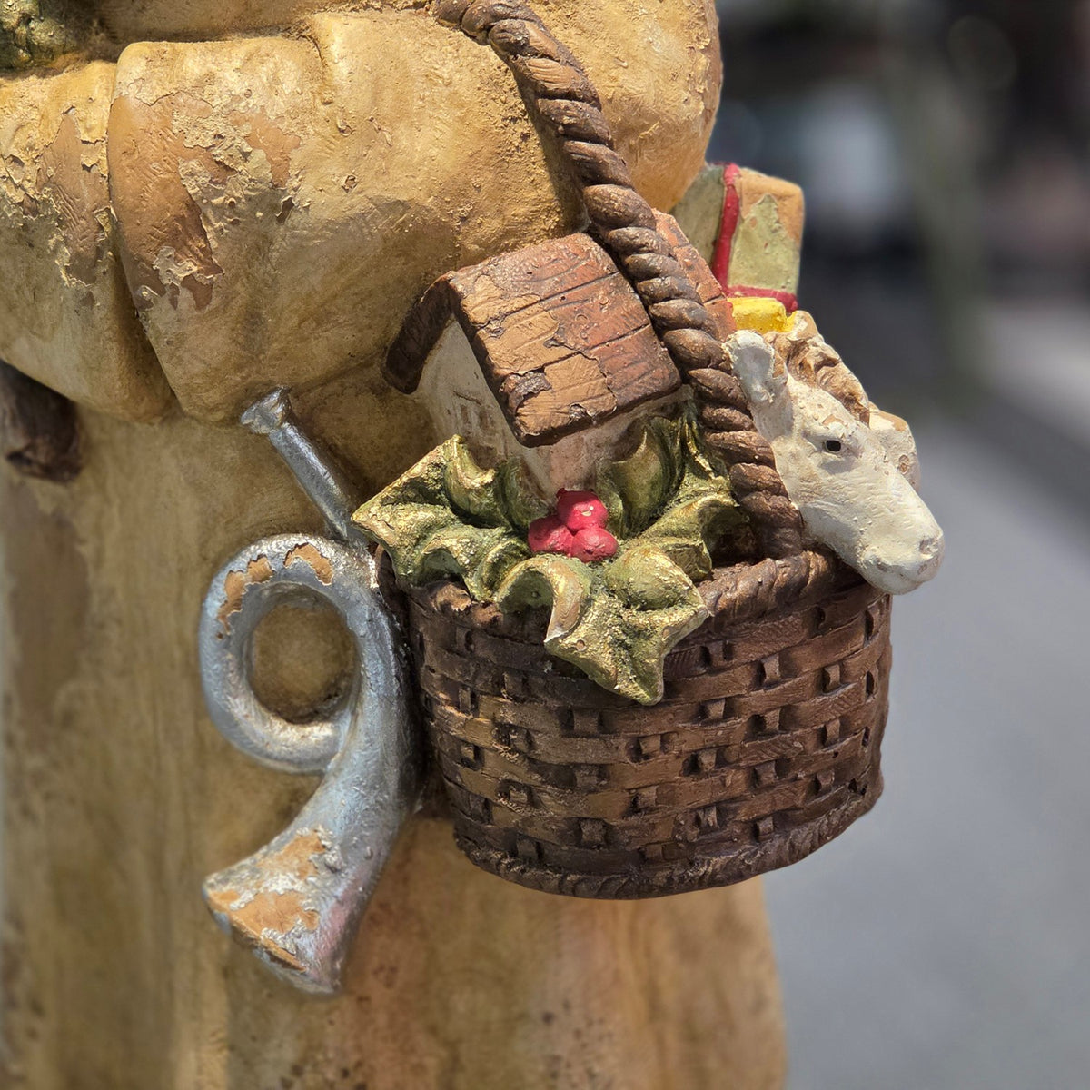 Detail of the brown woven-look basket filled with colorful seasonal items