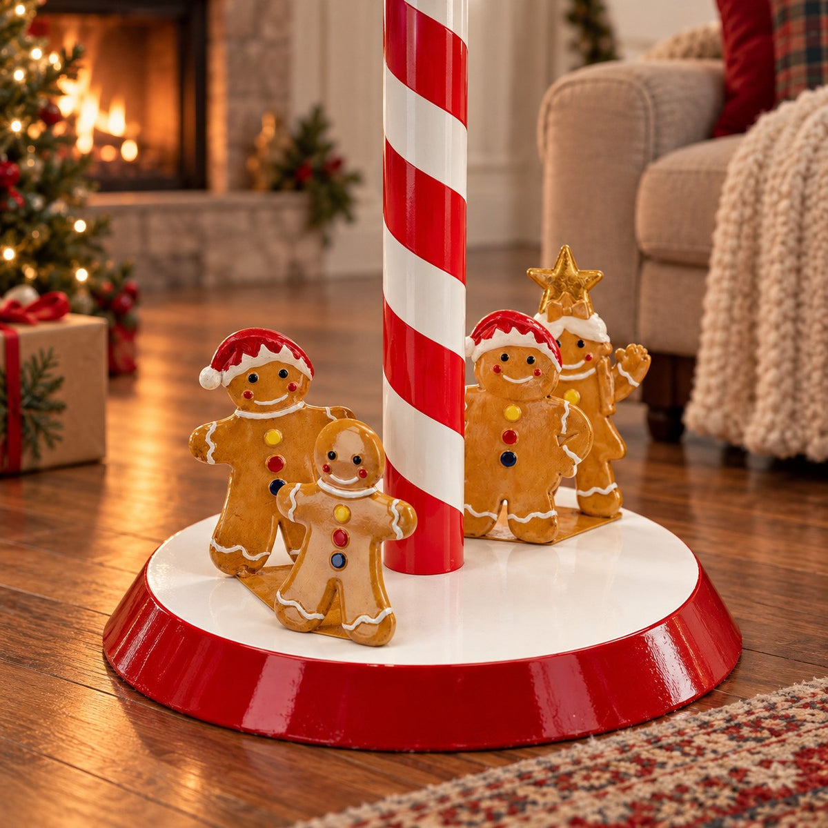 Close view of the striped post and round base, with gingerbread figures arranged around the post.