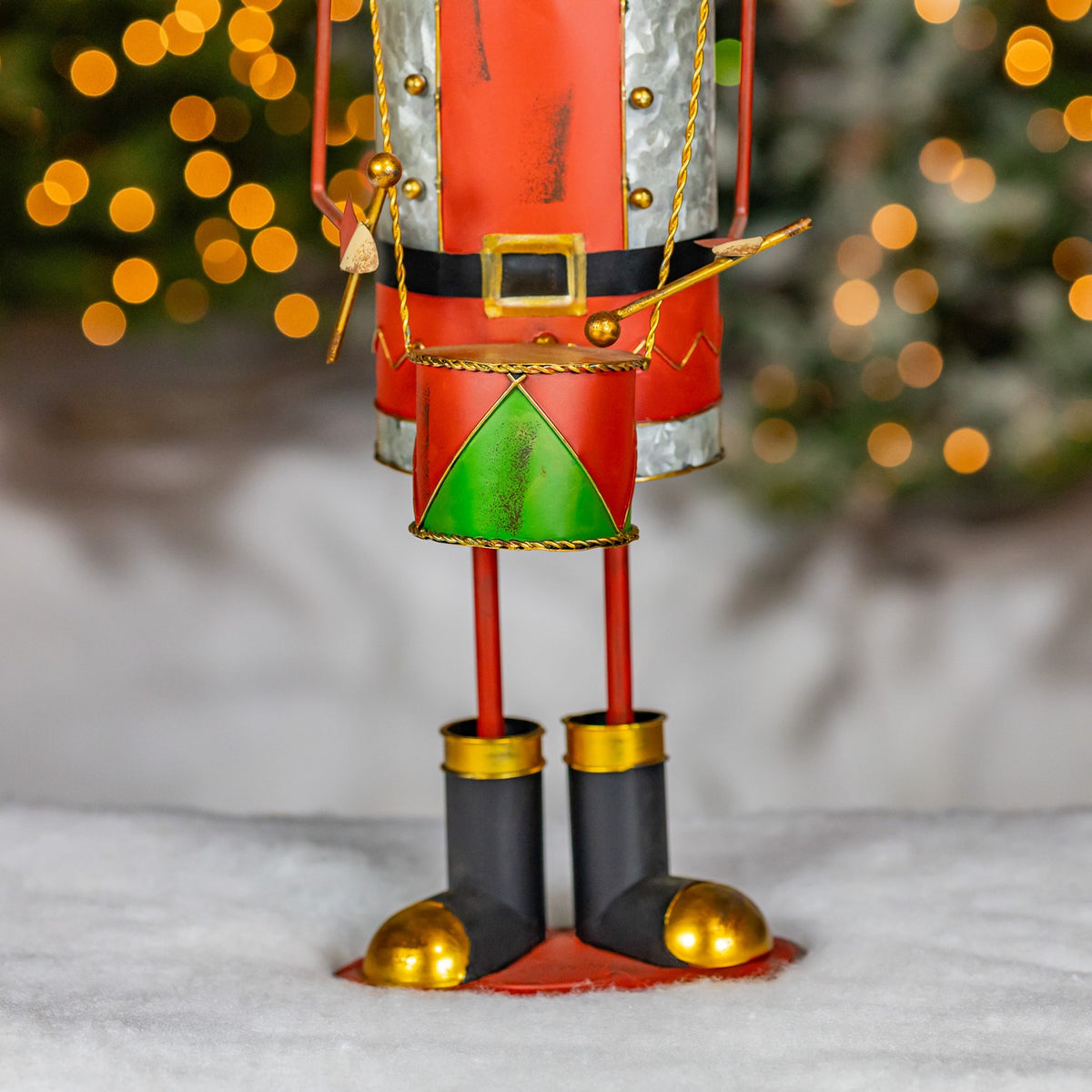 Close-up of the nutcracker's drum, uniform, legs, and boots