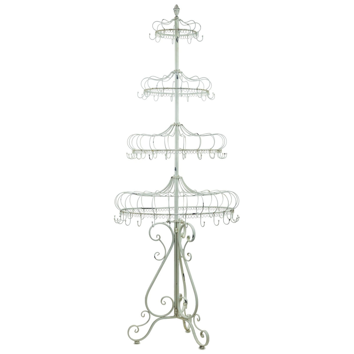 Tall pale metal display stand with four circular hook tiers and a curled ornamental base.