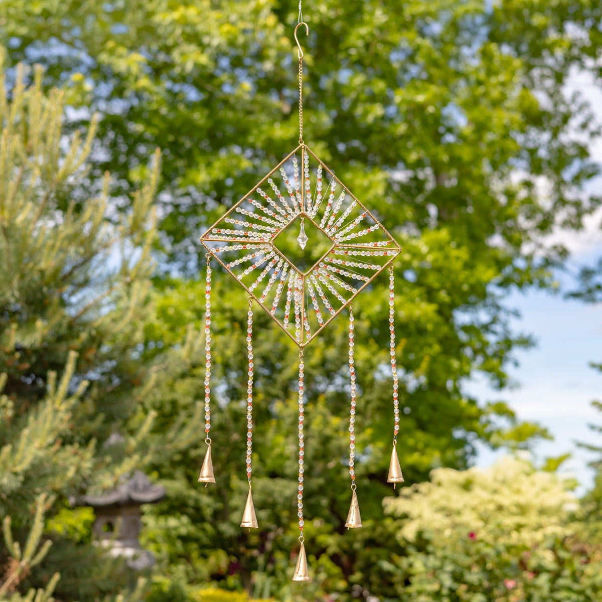 Diamond-shaped beaded metal chime with four hanging bells and a central diamond opening