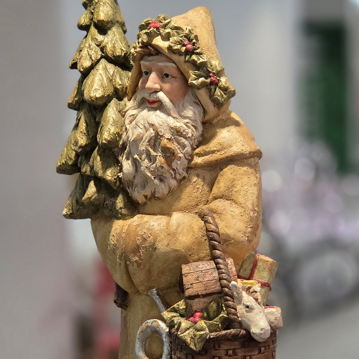 Side angle showing Santa's tree, robe, basket, and decorated hood