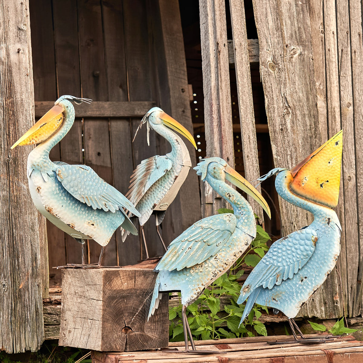 Set of 4 Assorted Style Coastal Blue Pelicans