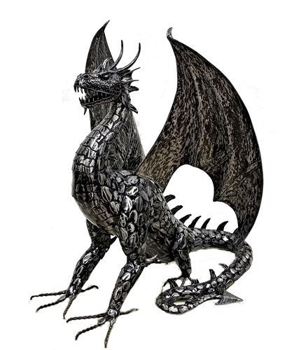 A dark metal dragon stands with wings spread, clawed feet planted and its curled tail resting behind it.