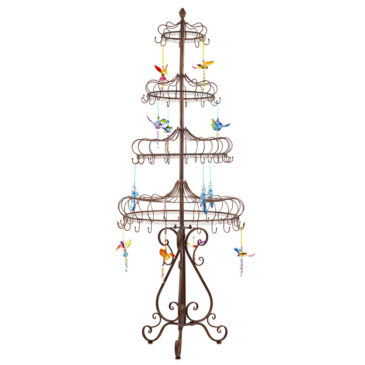 Tiered metal display stand with colorful hanging ornaments arranged among its hooks.