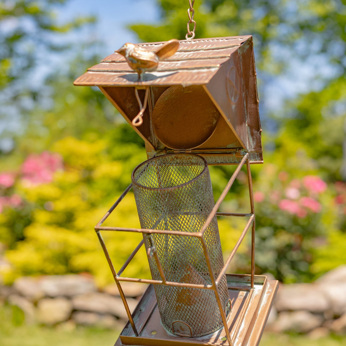 Underside view of the mesh seed cylinder and metal feeder frame