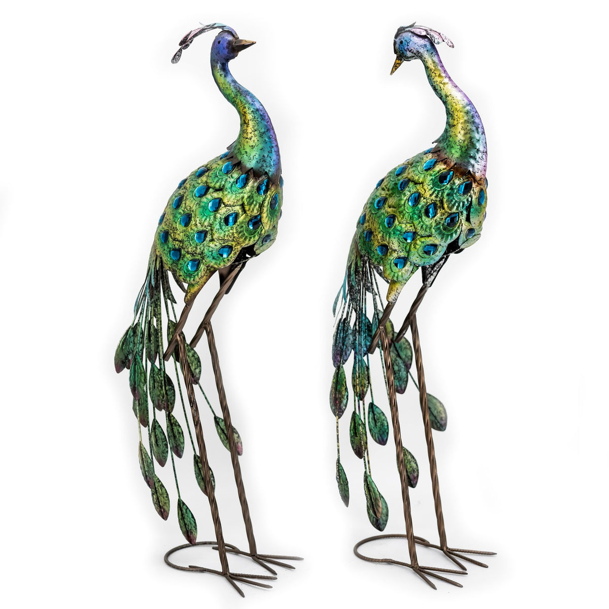 Two colorful metal peacock sculptures shown from the front against a white background.