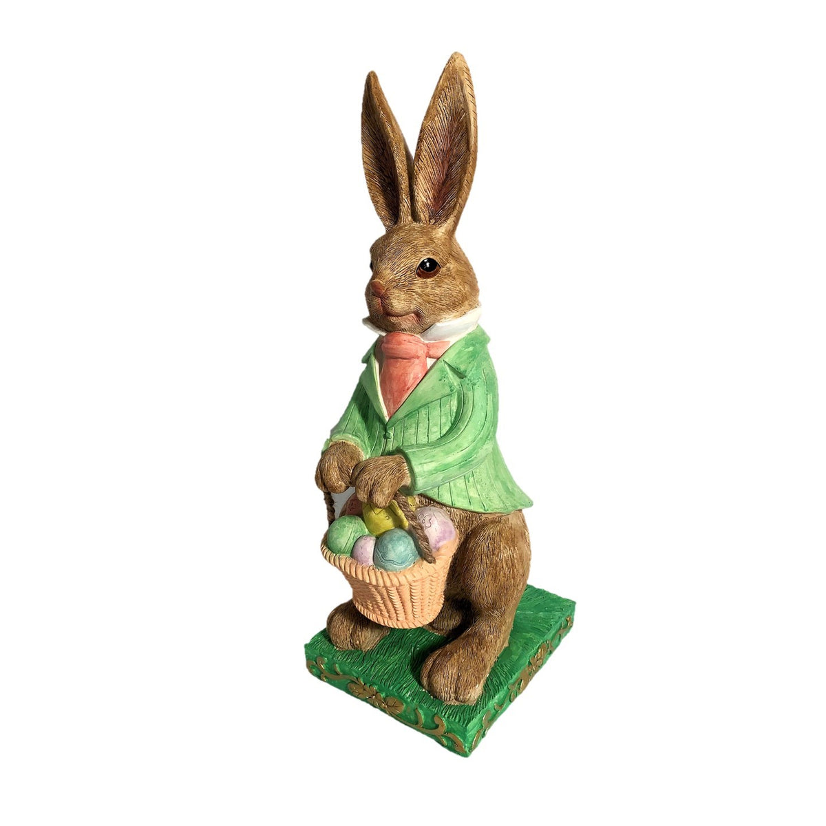Full rabbit statue in a green coat and pink necktie, holding a basket of colorful eggs on a green base.