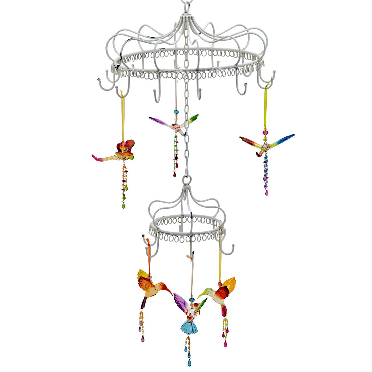 Closer view of the chandelier’s hooked tiers holding bright bird and dragonfly ornaments.
