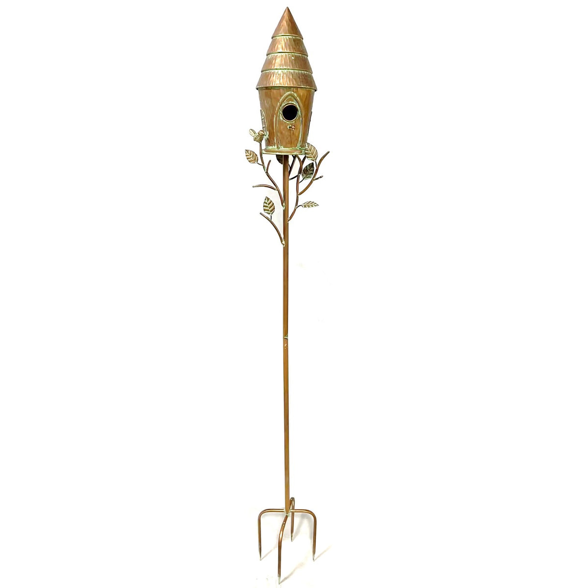 Copper-toned birdhouse with a tiered conical roof on a long stake with branching leaves and ground prongs.