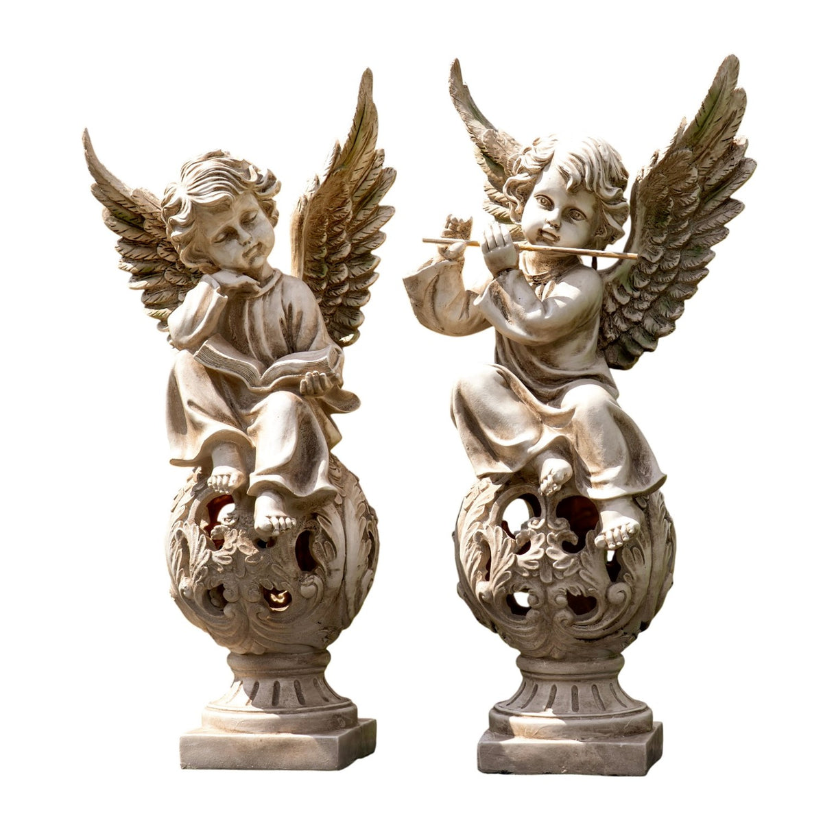 Two winged cherub statues seated on ornate openwork pedestal bases, one holding a book and the other playing a flute.