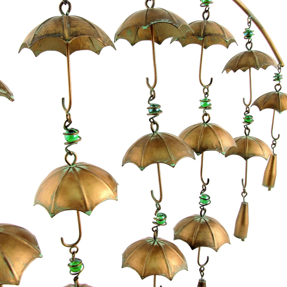 Close-up of bronze-toned umbrella shapes, curled hooks, green accents and hanging bell weights.