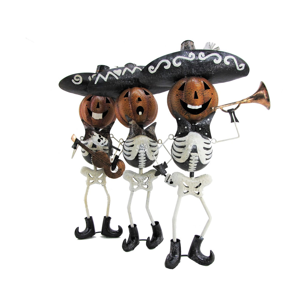 Three pumpkin-headed skeleton figurines wear sombreros and carry a guitar, small instrument, and trumpet.