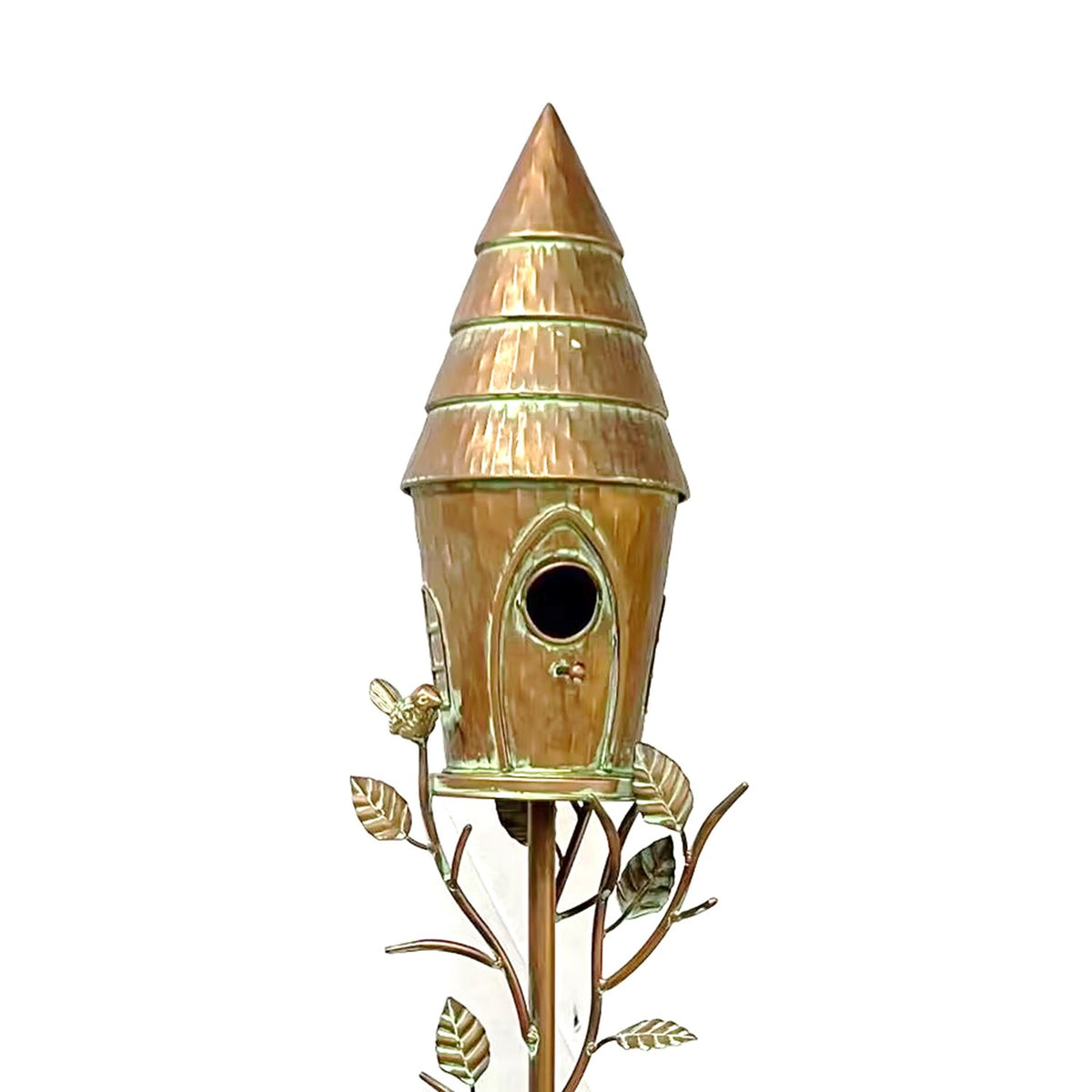Close view of the birdhouse’s tiered roof, round entrance, and decorative leafy branches.