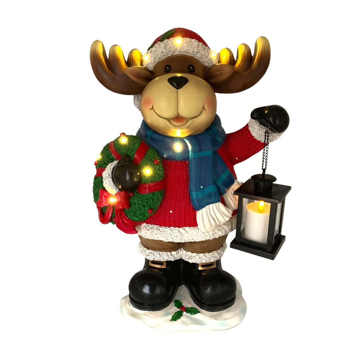 Moose decoration facing forward in a Santa hat and scarf, holding a wreath and glowing lantern.