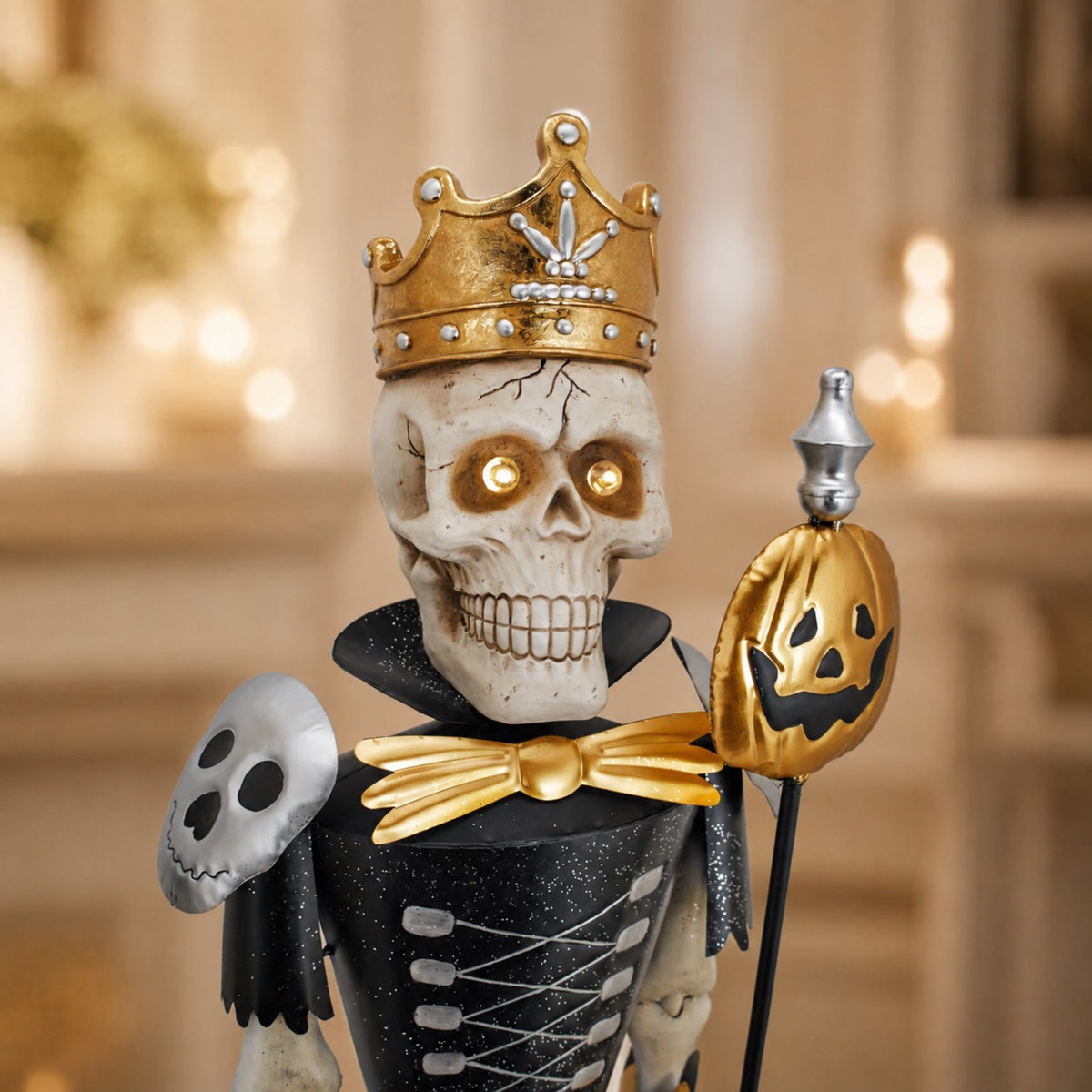Close-up of a crowned skeleton sentry with glowing eyes and a gold jack-o’-lantern staff.