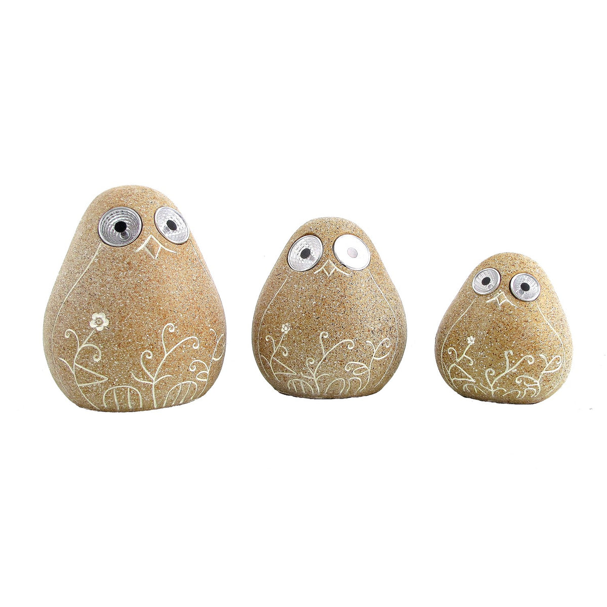 Three tan stone-look birds in graduated sizes, each with reflective eyes and etched floral details.