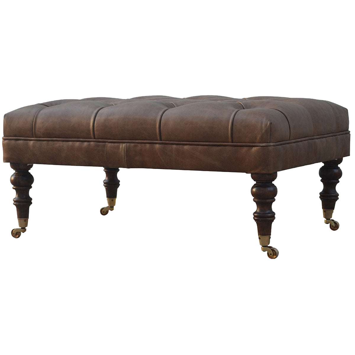 Brown leather ottoman viewed from the opposite front-side angle with buttoned top.