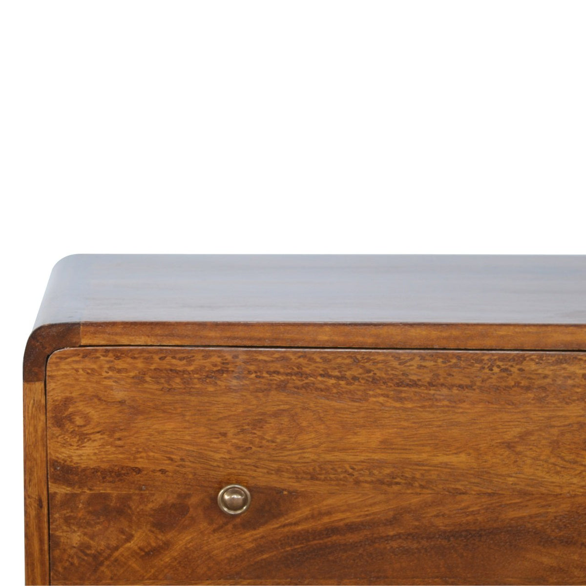 Close-up of the chestnut finish, rounded top corner and shiny drawer knob