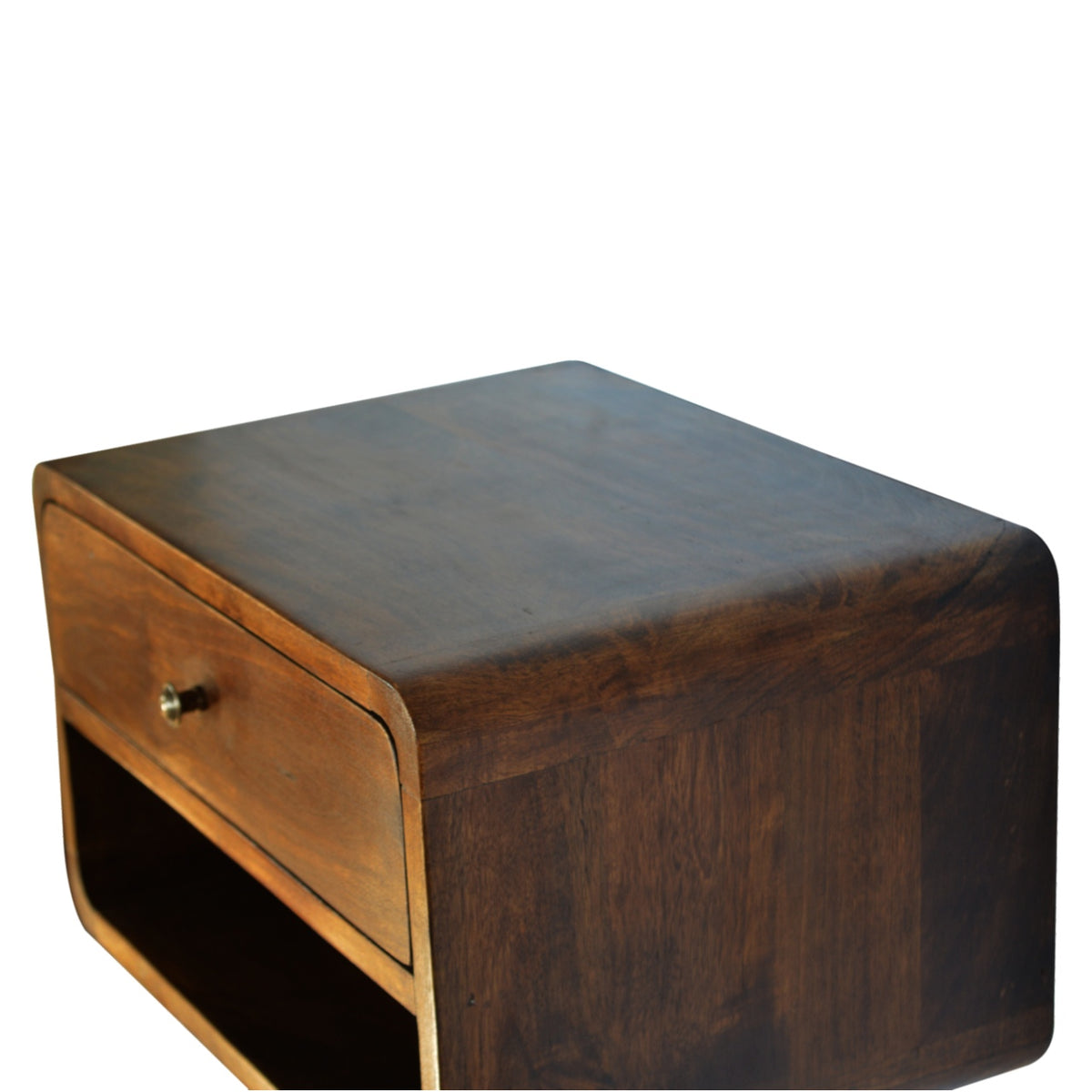 Angled overhead view showing the chestnut-finish nightstand top and rounded side