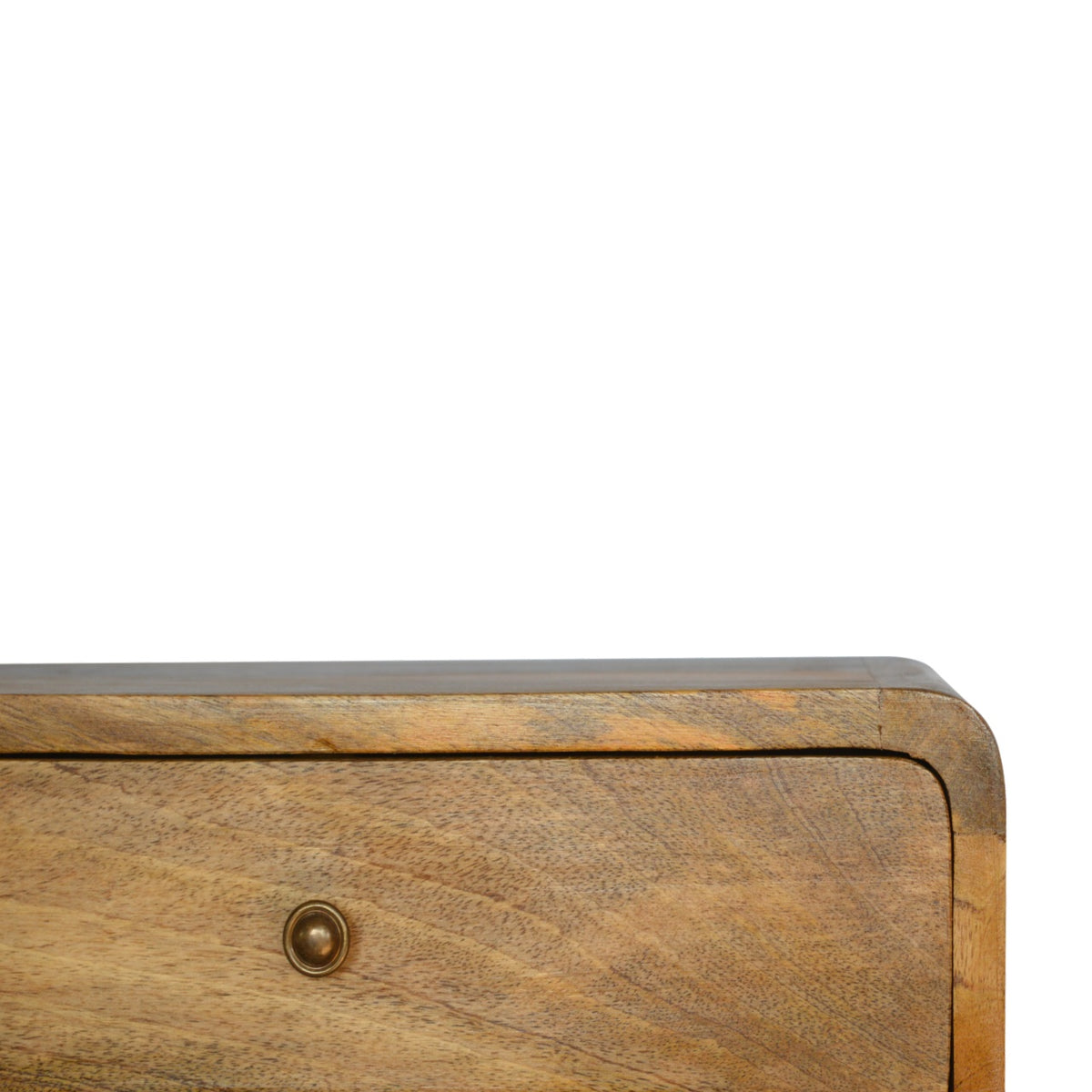 Close-up of the warm brown drawer front and round knob