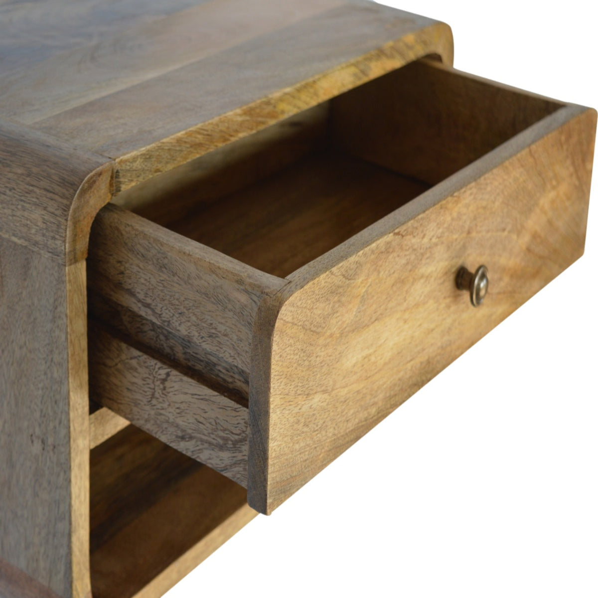 Close-up of the nightstand drawer pulled open, showing its wooden interior