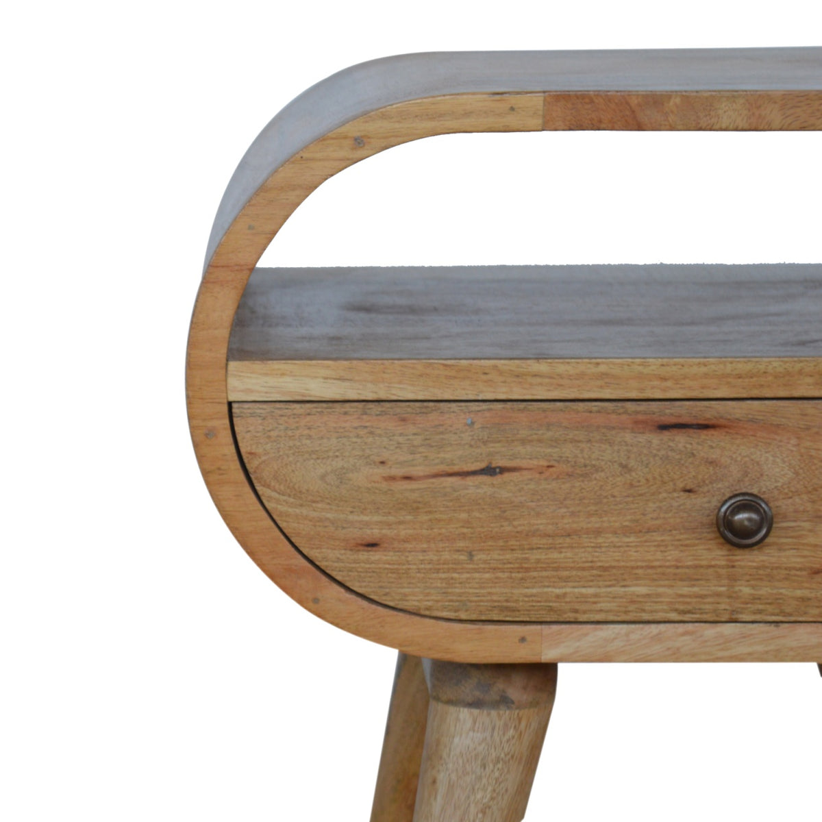 Close-up of the rounded side, open shelf, and drawer front of the wooden nightstand