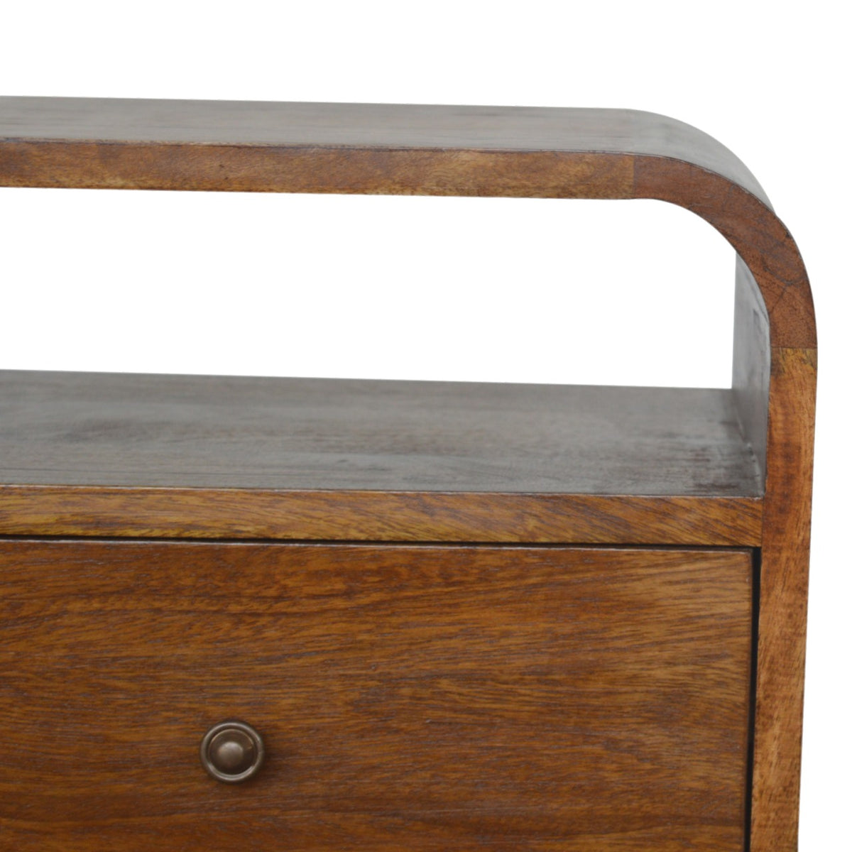 Close-up of the rounded top edge, upper open slot and drawer front