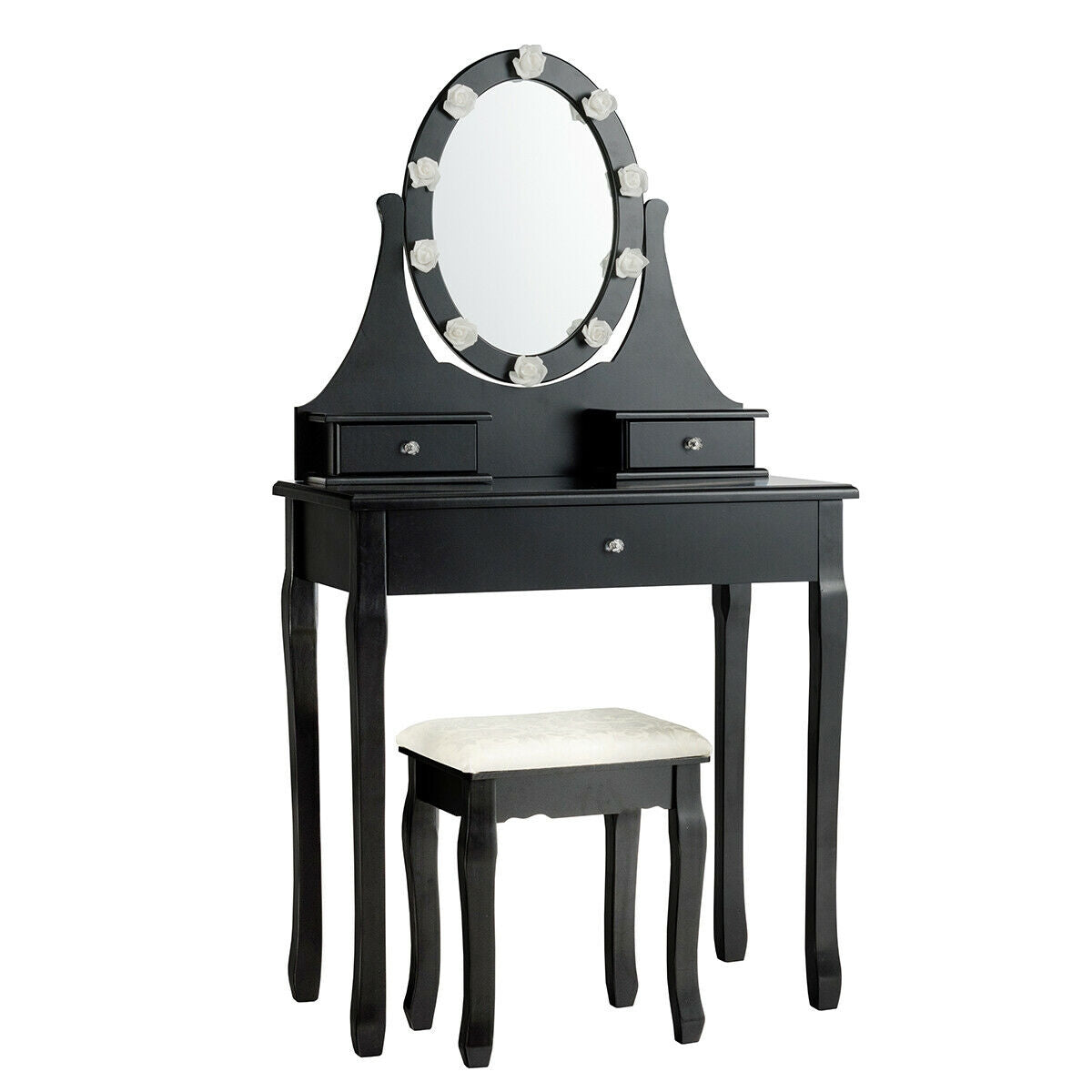 Black vanity set with oval mirror, unlit bulbs, two small drawers, a wide drawer, and a white-cushioned stool.