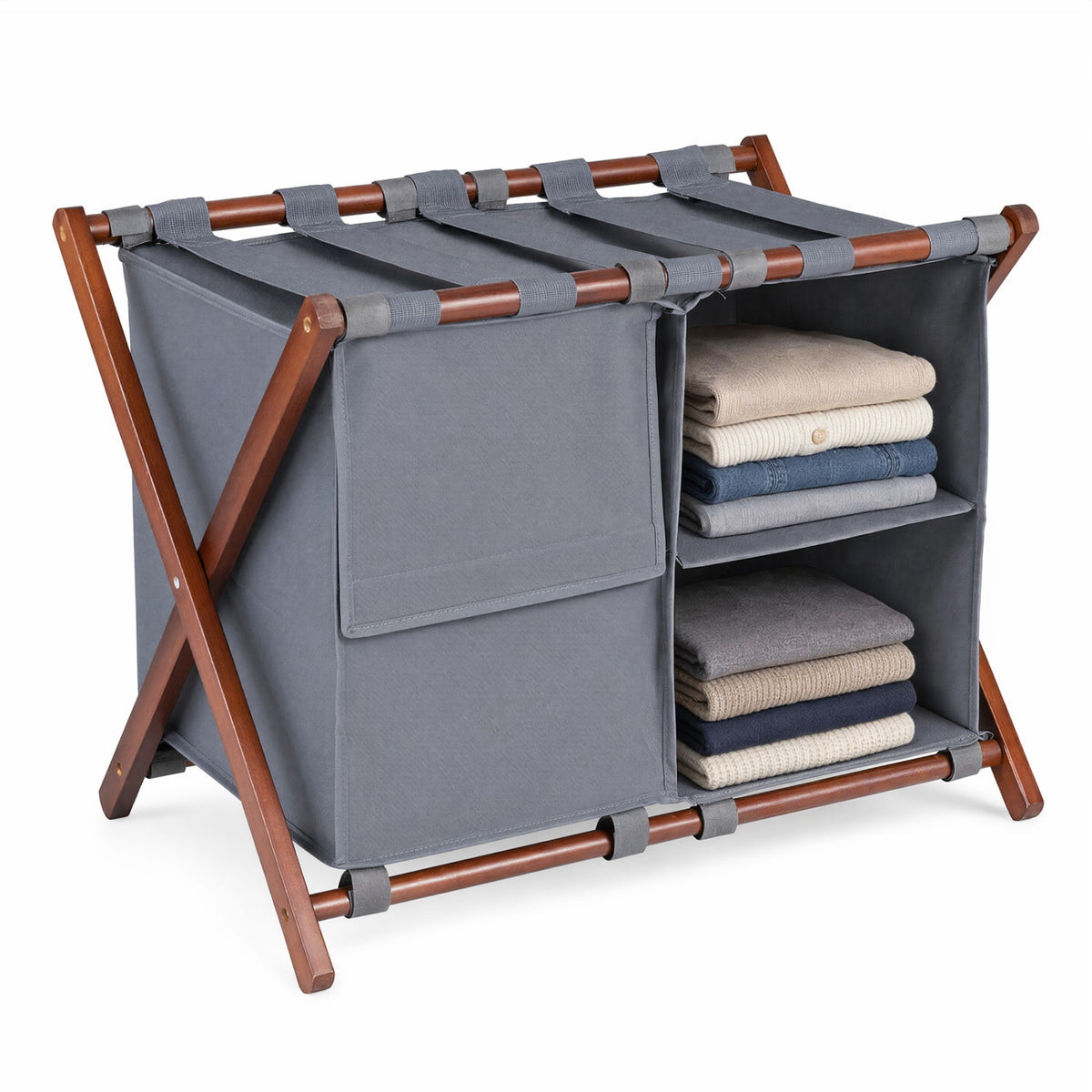 Gray luggage rack with walnut-toned legs displays neatly folded towels in its two open shelves.