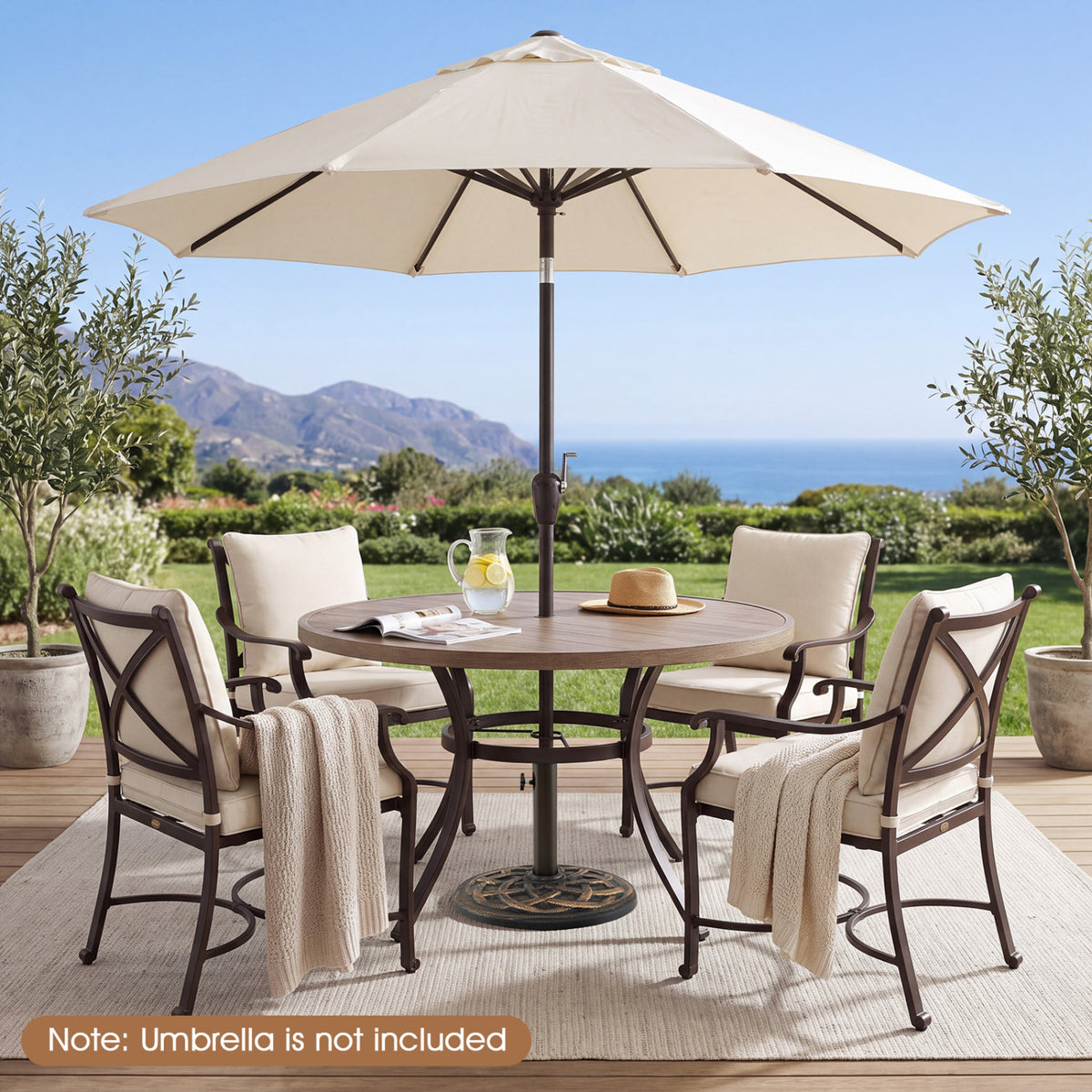 Umbrella base beneath a dining table surrounded by four chairs on an outdoor terrace.